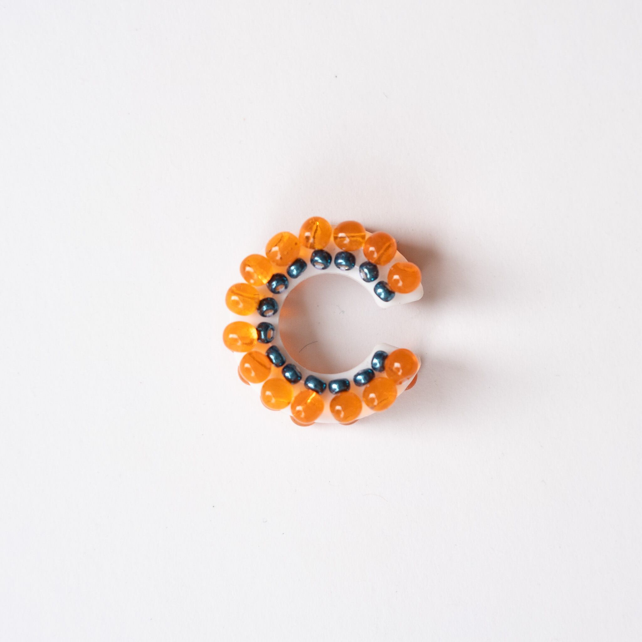 puzzle ring ear cuff [33]