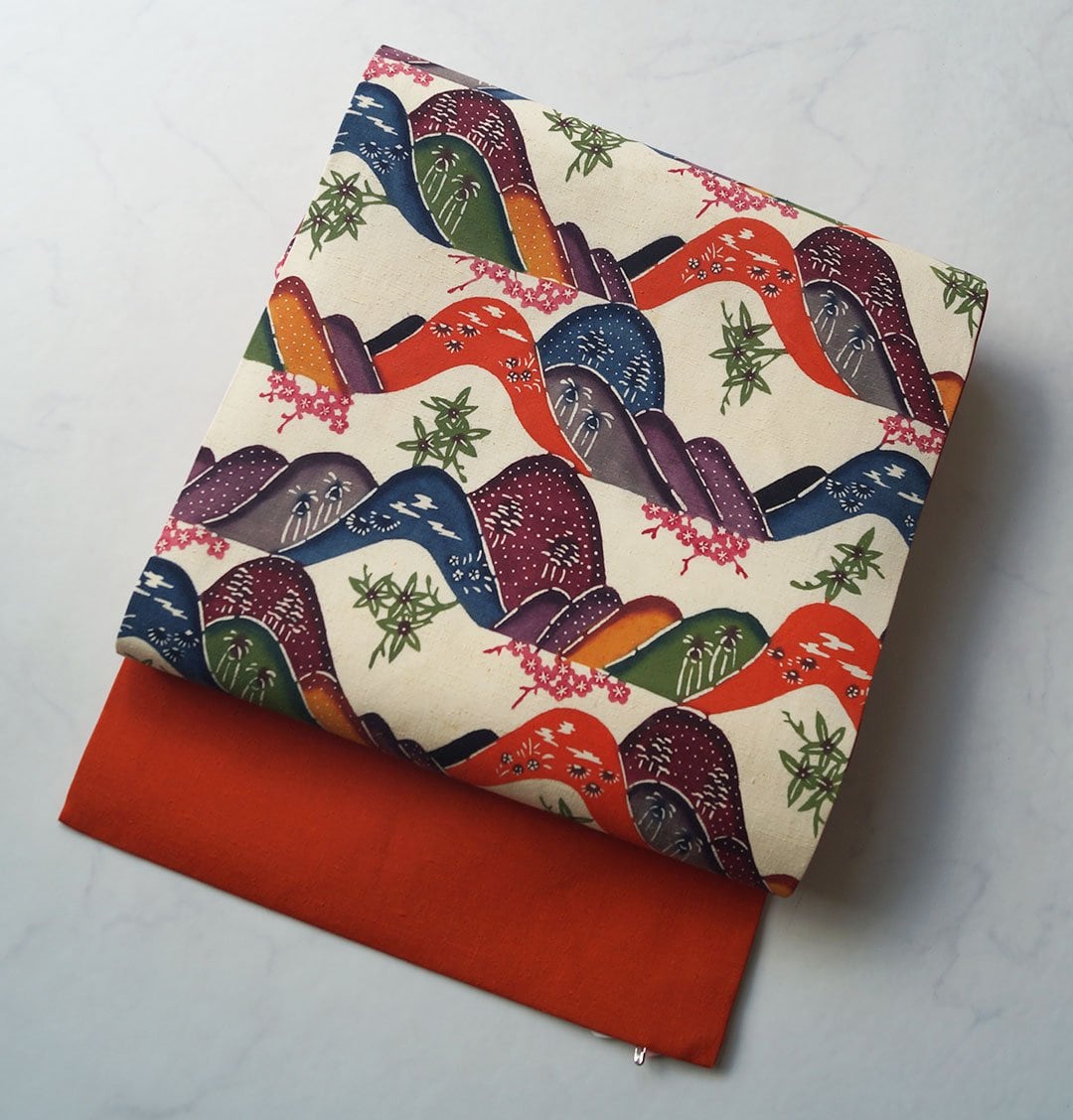 【難あり・なごや帯】 生成り色×朱色系 遠山文 型染め 紬なごや帯