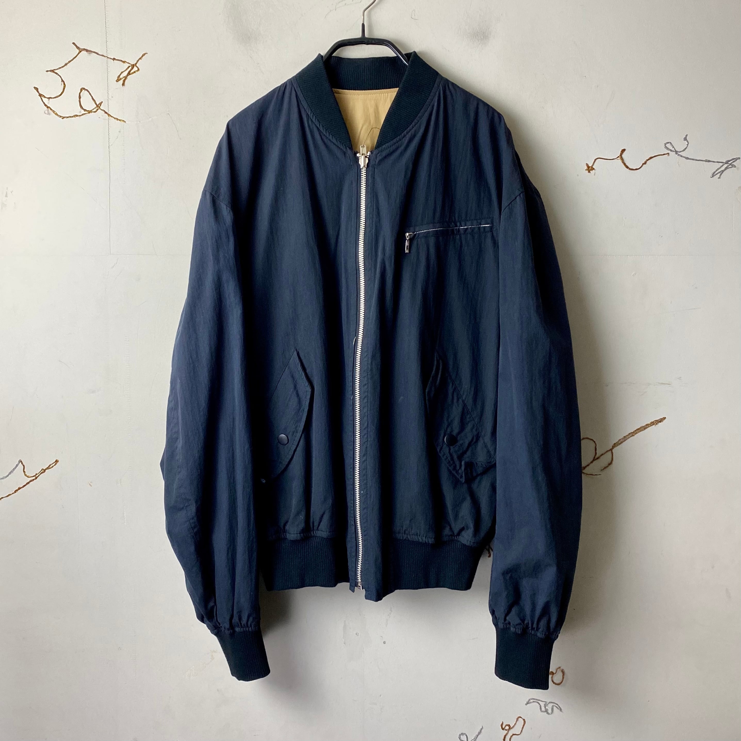 old Mr.JUNKO logo print reversible bomber jacket | NOIR ONLINE old Mr.JUNKO logo print reversible bomber jacket | NOIR ONLINE