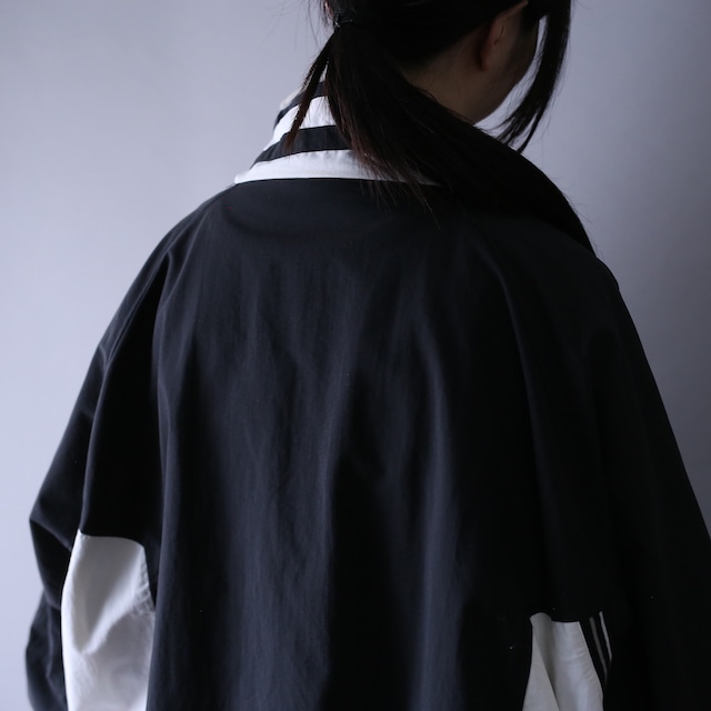 "Reebok" monotone coloring over silhouette mountain jacket