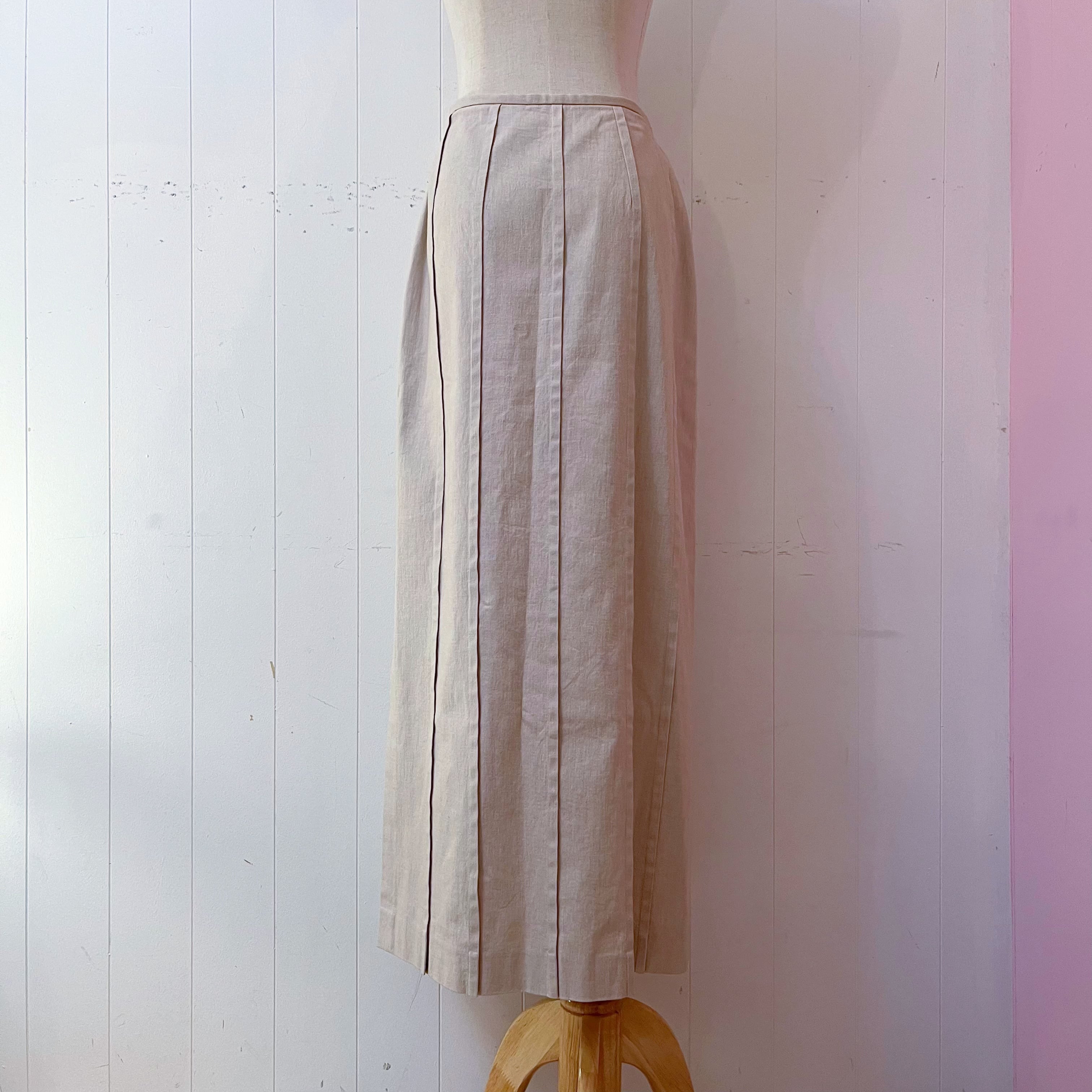 beige pleats side slit long skirt