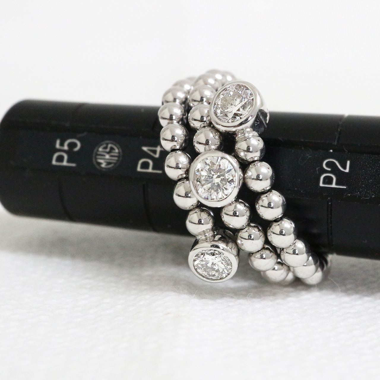 形状記憶 トリロジー ダイヤモンド リング フリーサイズ k18 pt900  