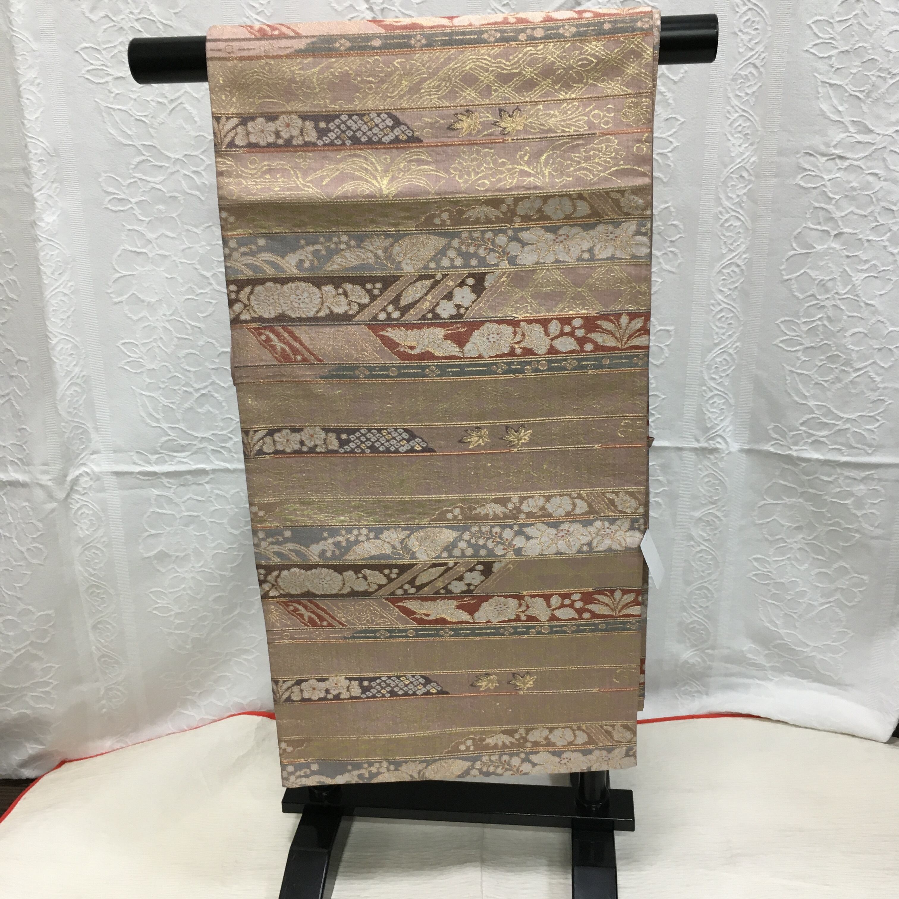 袋帯（肌色地横段に鳥、辻ヶ花模様）