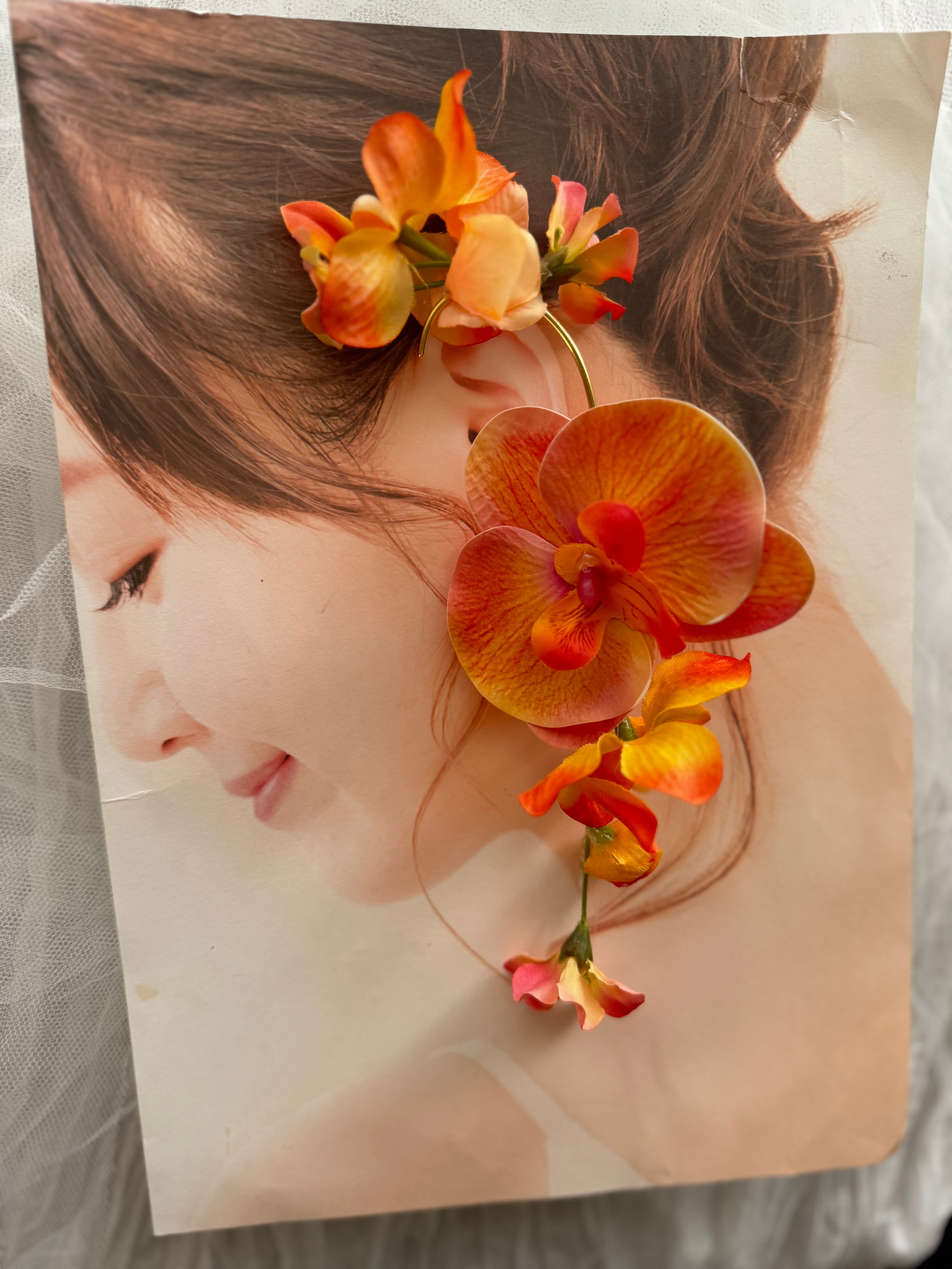 フラワーイヤーカフ☆オレンジ胡蝶蘭 | houkiboshi