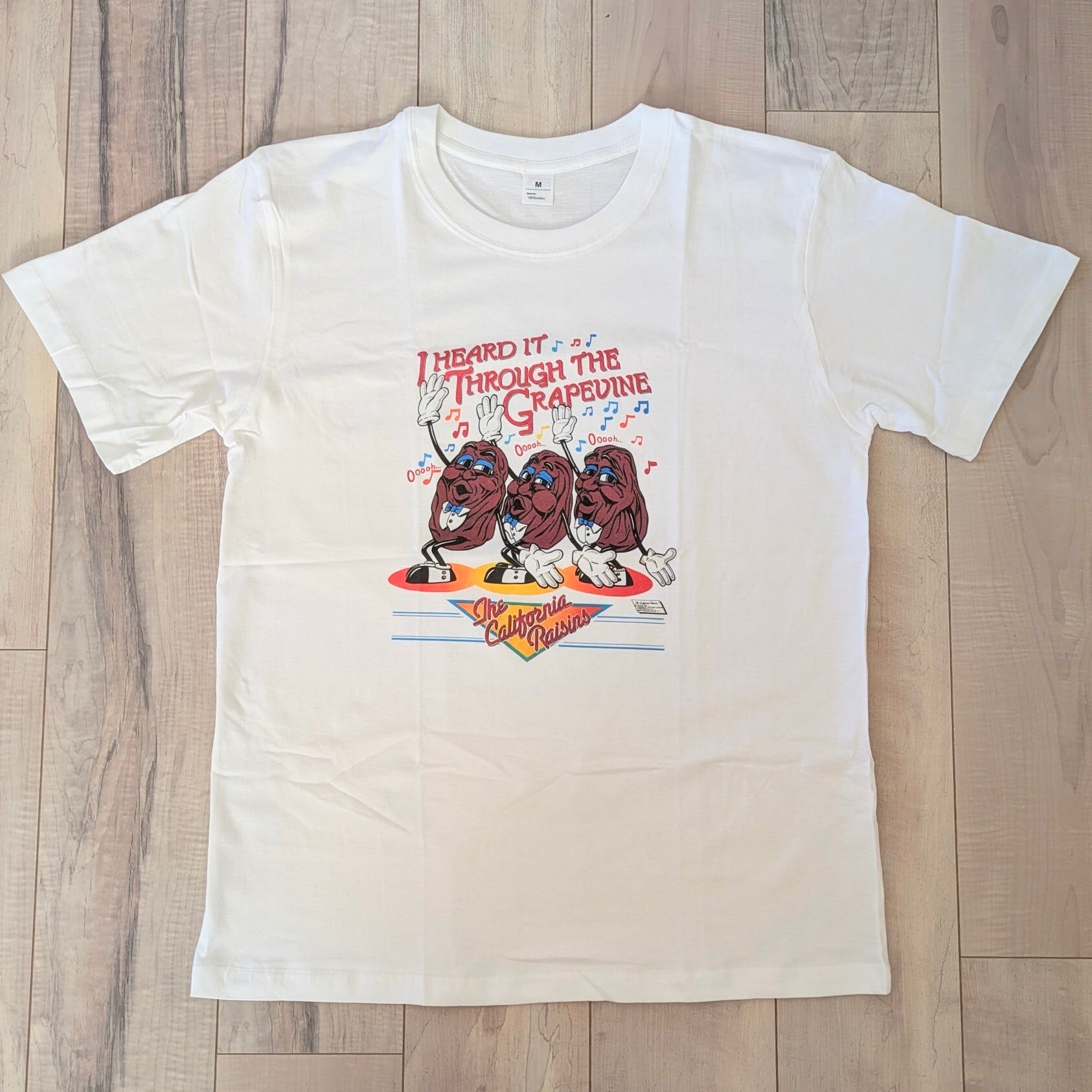 【 California Raisins（ カリフォルニアレーズン ）】『 I HEARD IT THROUGH THE CRAPEVINE 』/ Tシャツ〚アメリカン雑貨 アメトイ〛