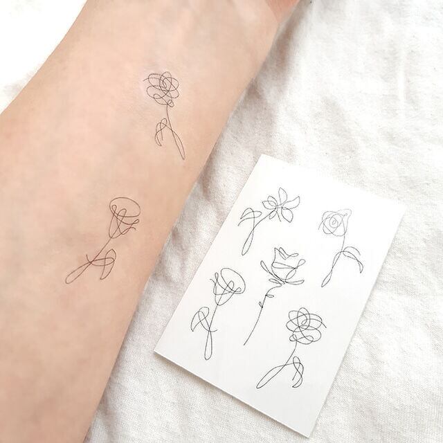 くるくるっとかわいいラインで花の線画のタトゥーシール ハーフサイズ Acubi Drops