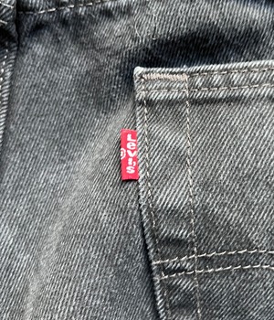 Used 35inch Levi's 550 black denim pants