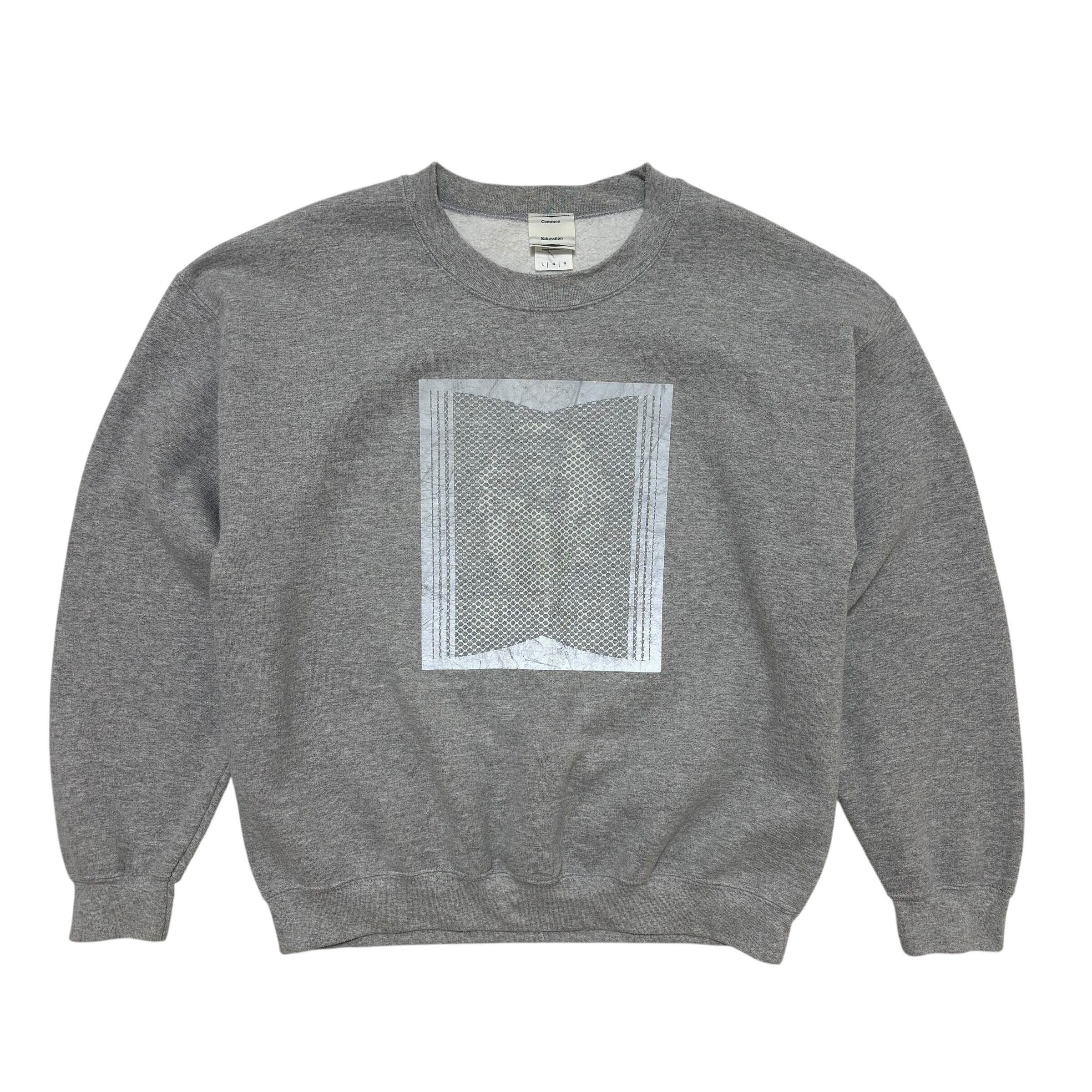 古着 コモンエデュケーション COMMON EDUCATION 特殊プリント スウェットシャツ トレーナー クリーニング済み メンズL