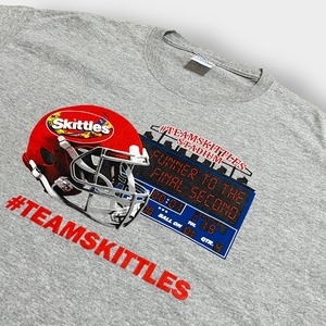 【PORT&COMPANY】Skittles スキットルズ アメフト TEAMSKITTLES 企業系 ロゴ Tシャツ 袖ロゴ サークルK CIRCLEKプリント L イラスト グレー 半袖 夏物 us古着