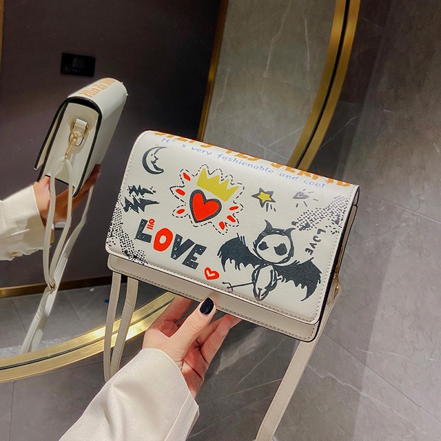 小さなバッグ女性バッグ2020新しいトレンディな野生の漫画シングルショルダーメッセンジャーバッグ夏のネット赤いファッション小さな正方形のバッグ Tiancai_Wing_Bag4453325