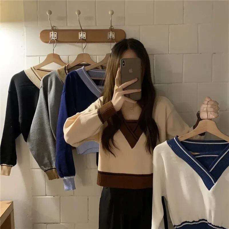 【新作】【送料無料】 初秋の韓国バージョンの新しいカレッジスタイルのルーズVネックフェイクツーピースたっぷりとした年齢を軽減する多用途セーター 0338117730298