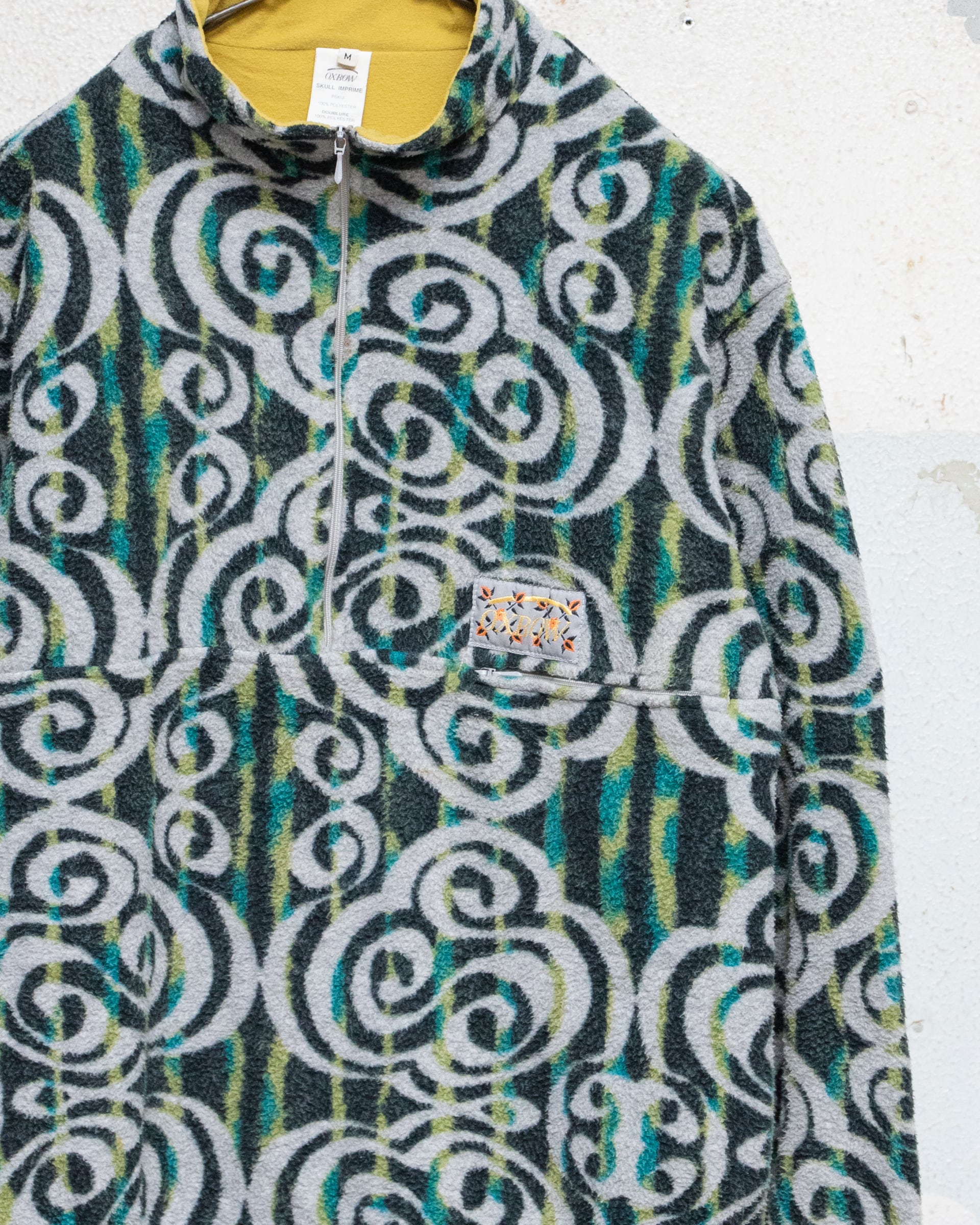 OXBOW” printed fleece half-zip smock / abstract SKULL IMPRIME
