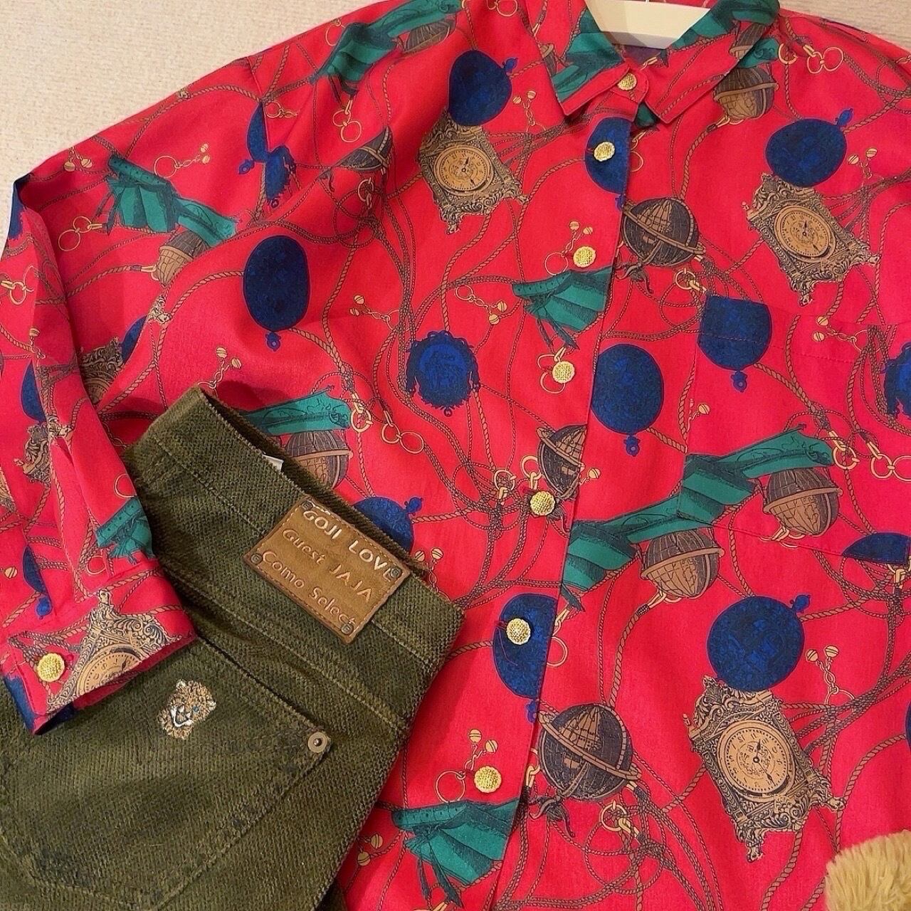 clock and globe red satin blouse