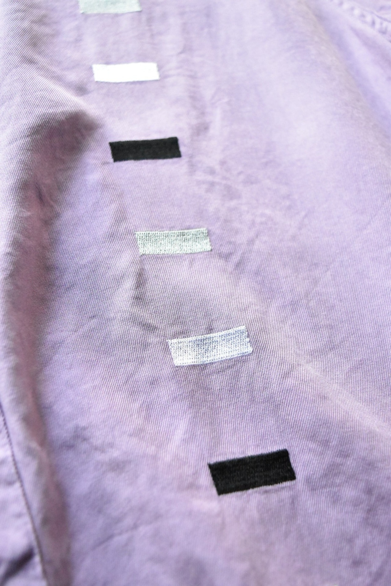 Purple shirt with block embroidery