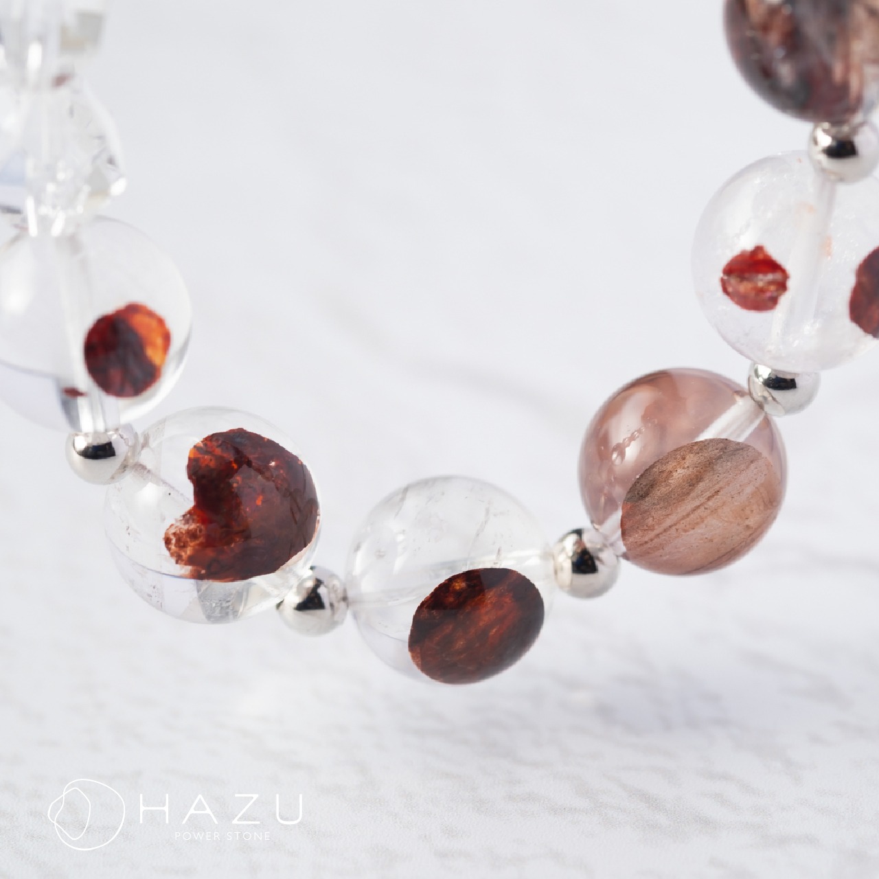 天眼模様／成功と幸運を呼ぶ赤い雫［ライモナイトインクォーツ／水晶］