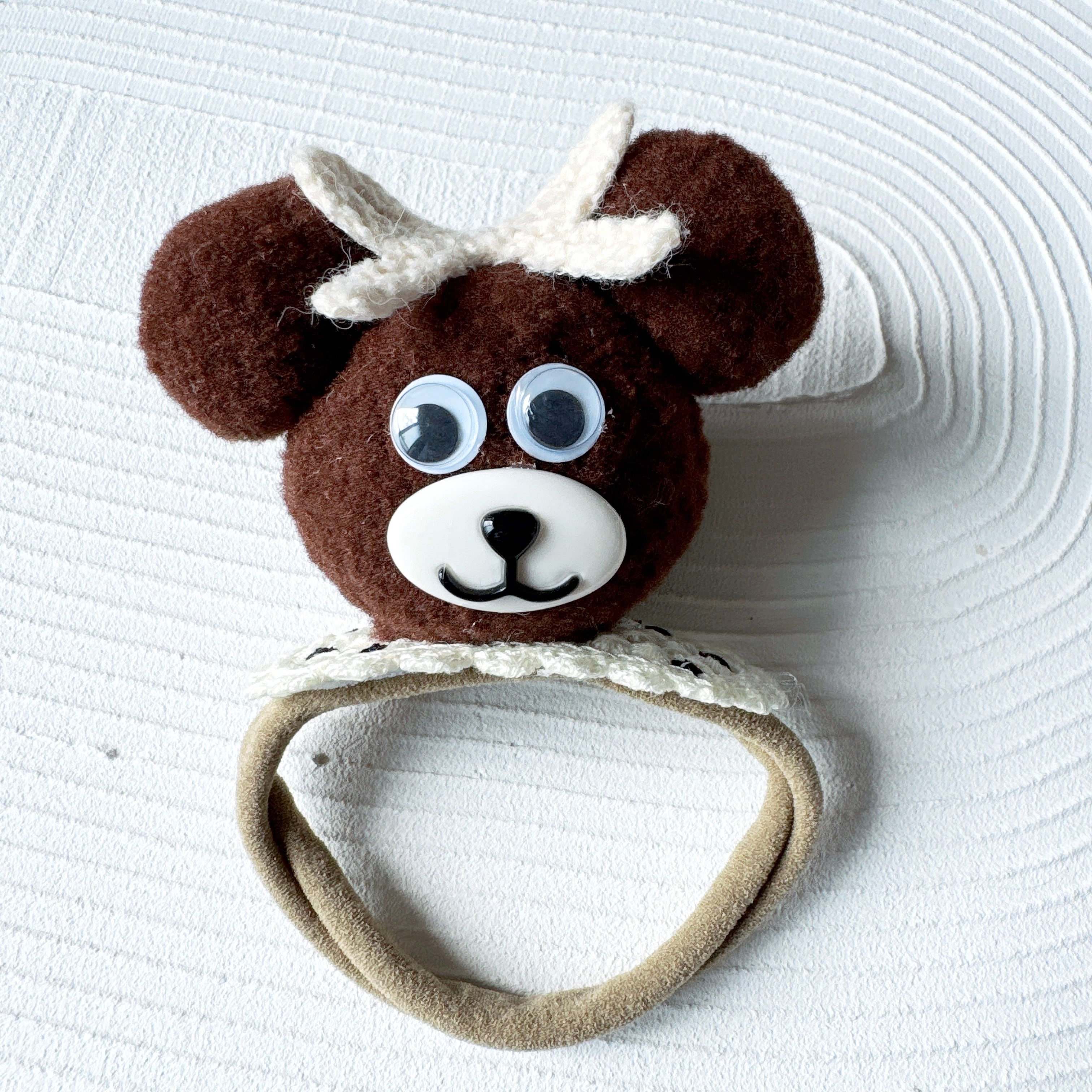 ホワイトリボンの大きなクマさんヘアバンド