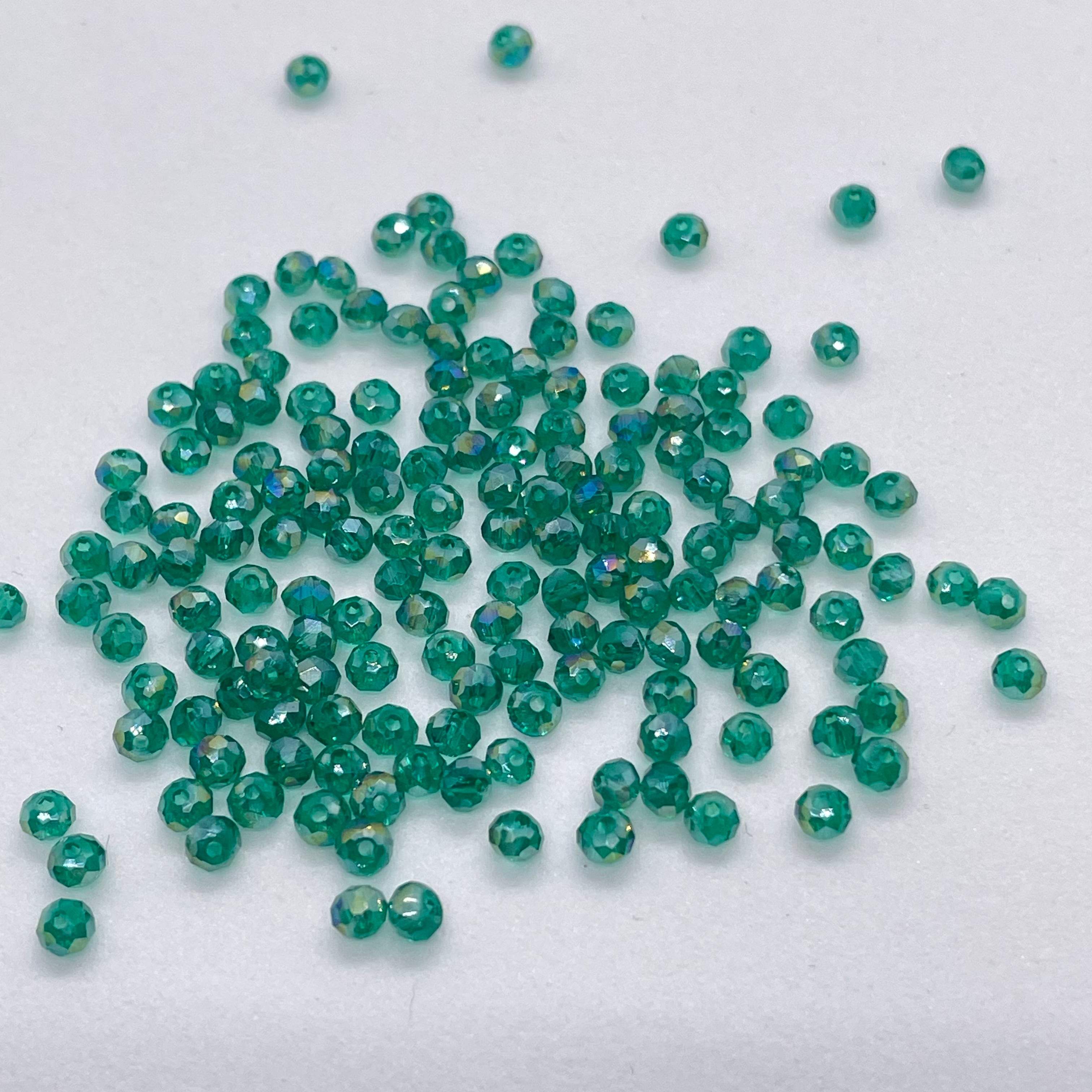 クリスタルビーズ 2mm [C-50 クリアオーロラフォレストグリーン]ボタン