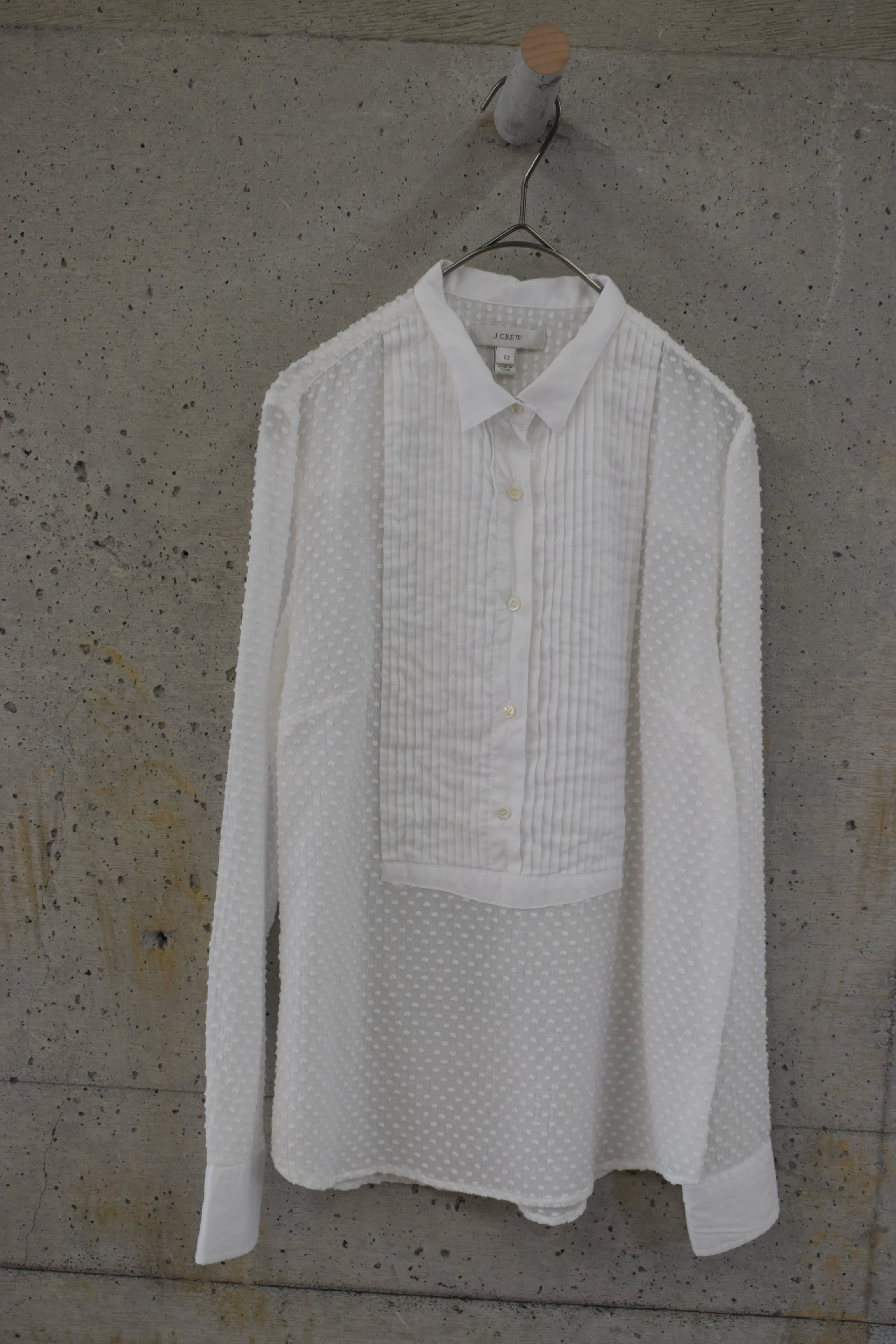Blouse with a textured, sheer fabric