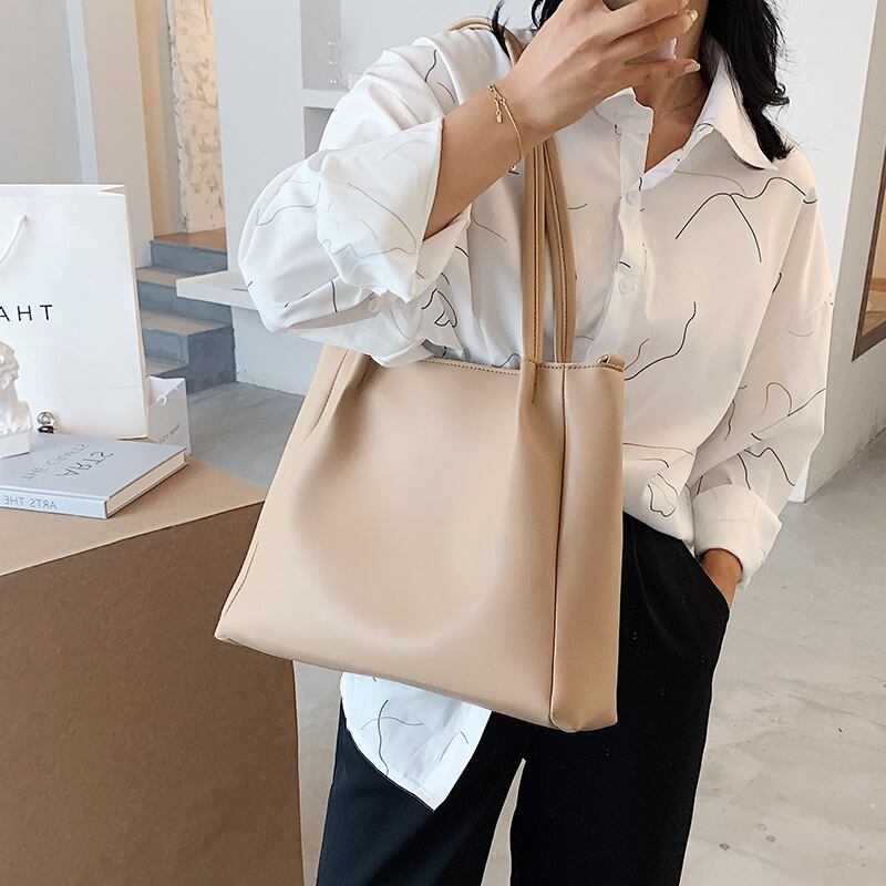 シンプルで大容量のワンショルダービッグバッグ女性2020新しい流行のファッション気質メッセンジャーバッグバージョンのネットレッドトートバッグ 手作りハンドバック84807470123