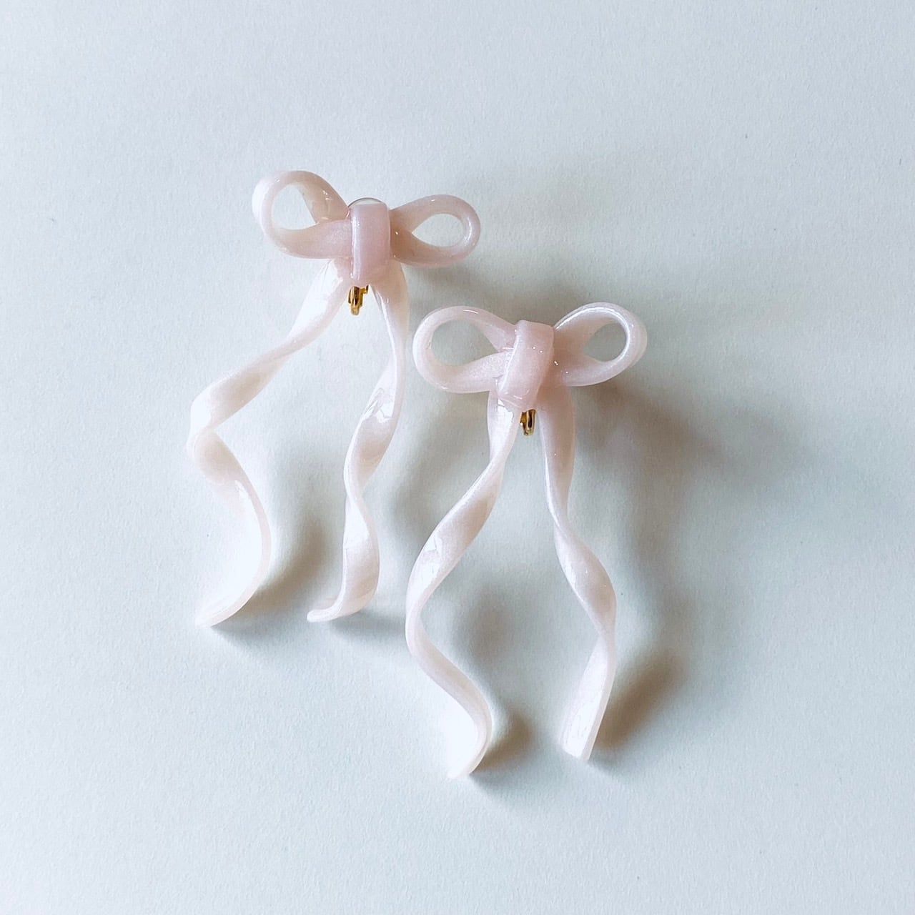 ribbon earring sheer pink