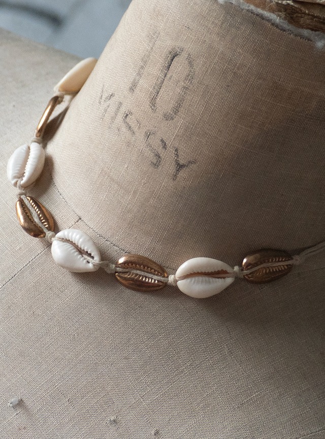 unknown used Cowrie and brass necklace