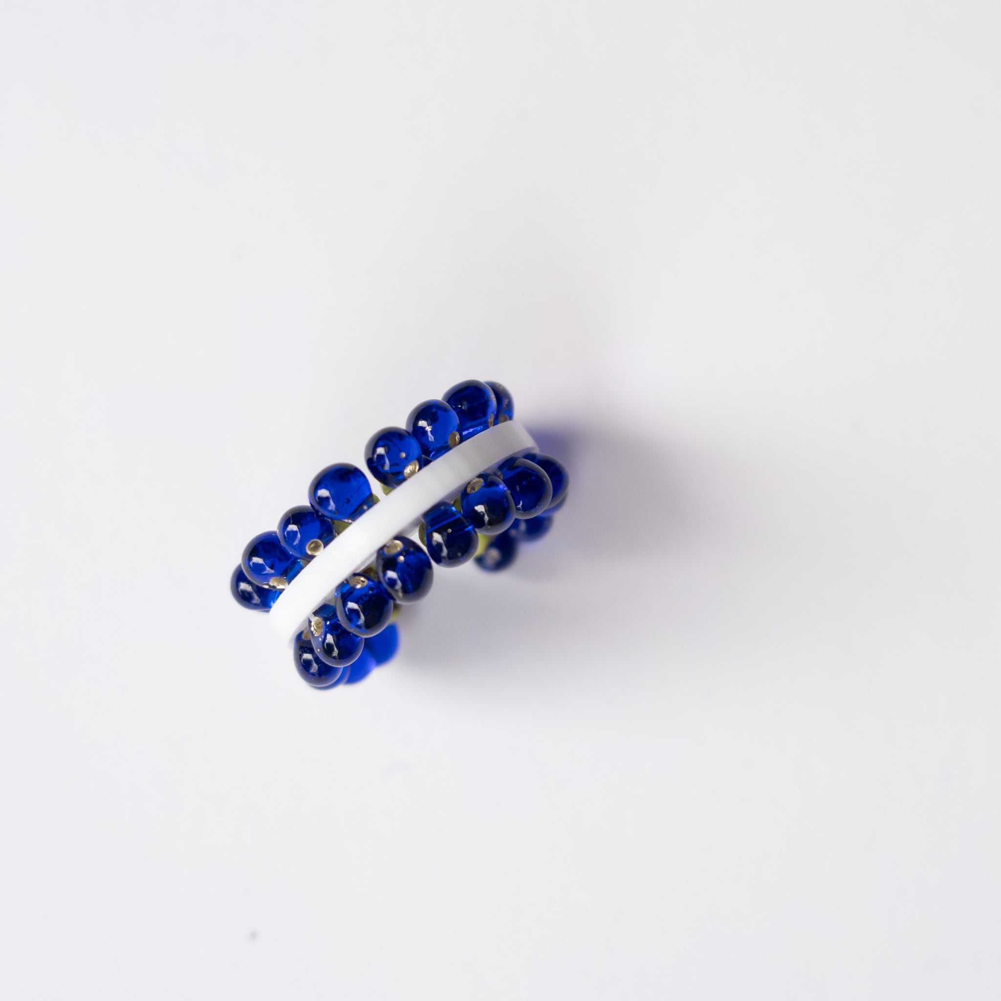 puzzle ring ear cuff [34]