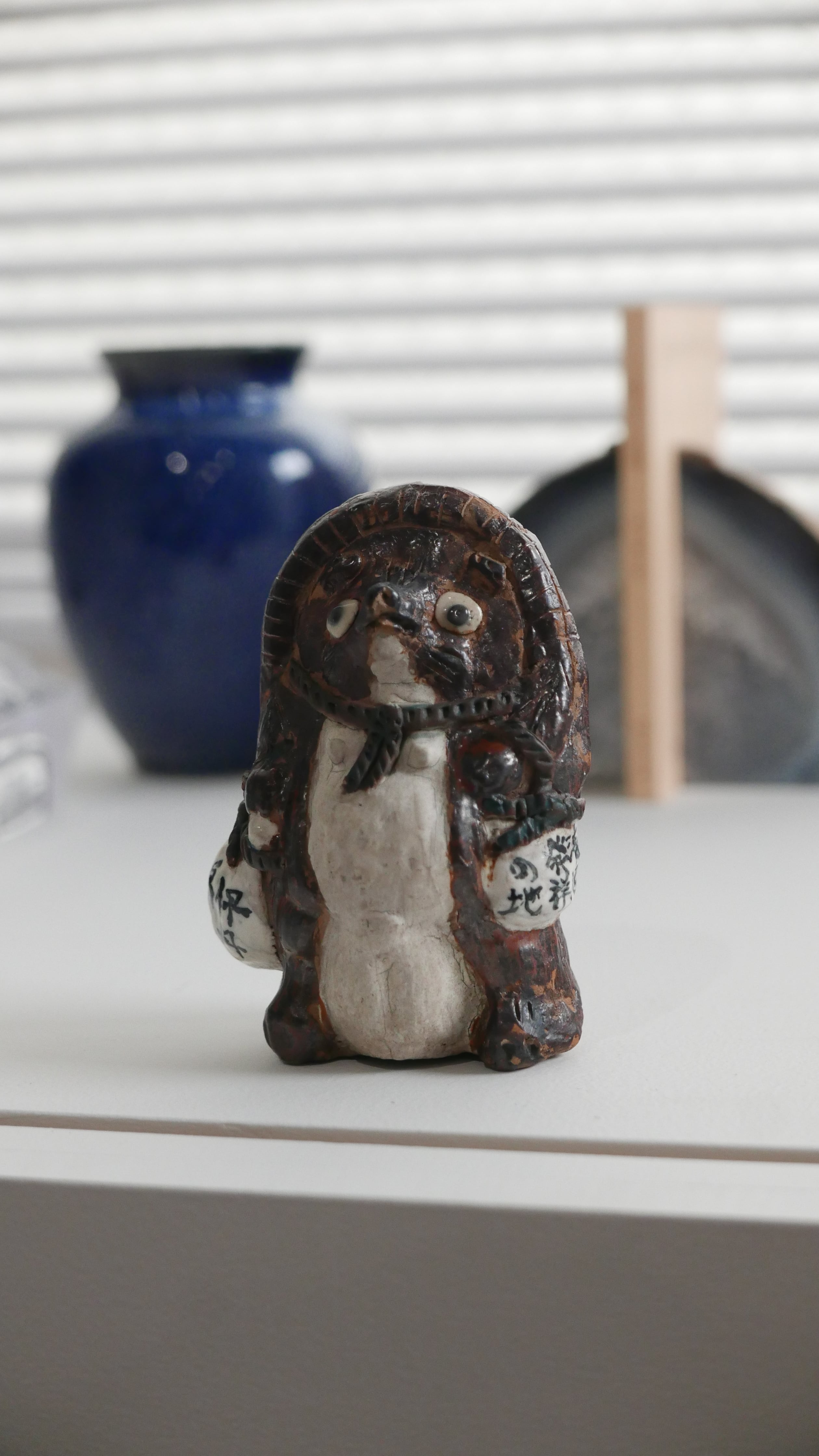 old tanuki object , sake / itami