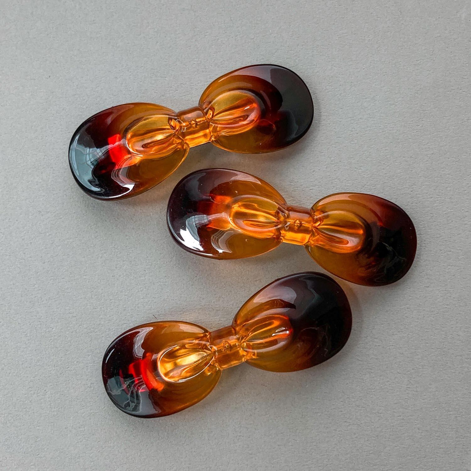 〈再入荷〉丸みリボン型べっ甲風バレッタ