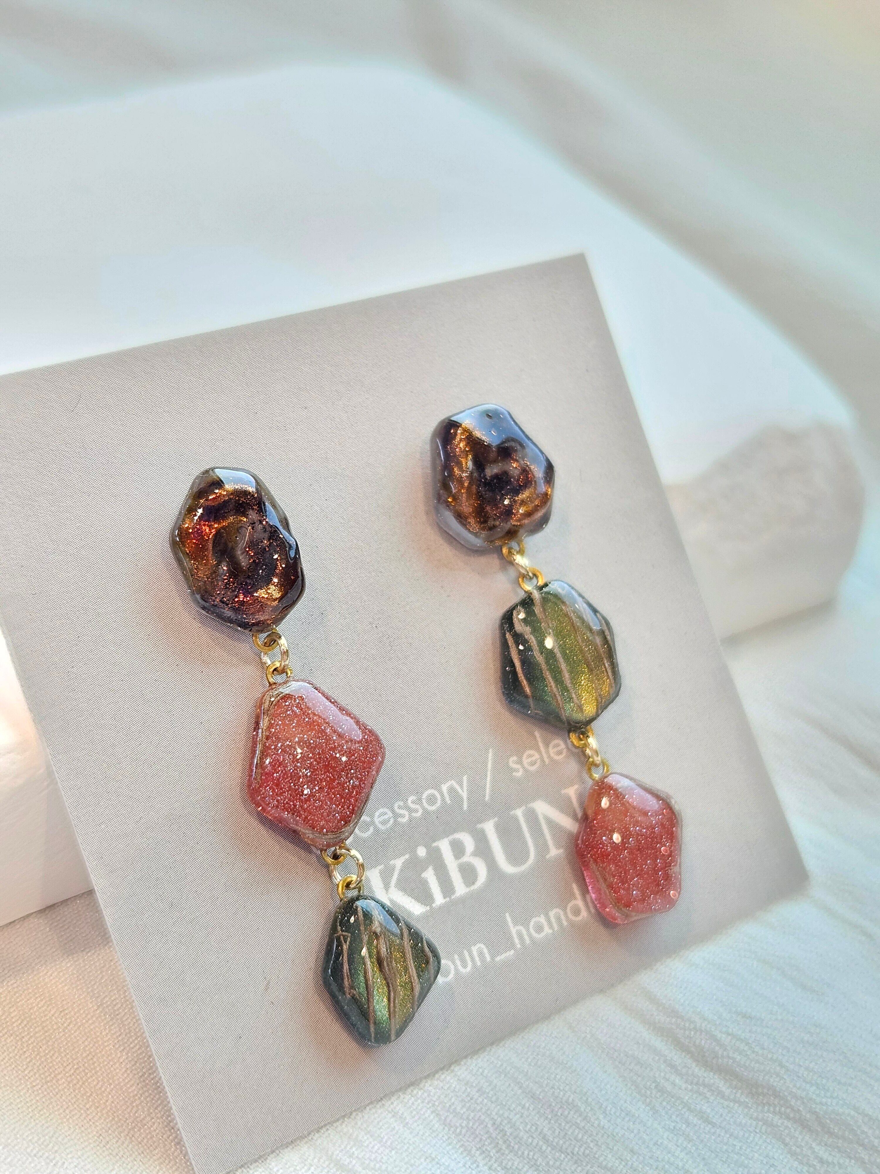 THREE ピアス オレンジ×グリーン