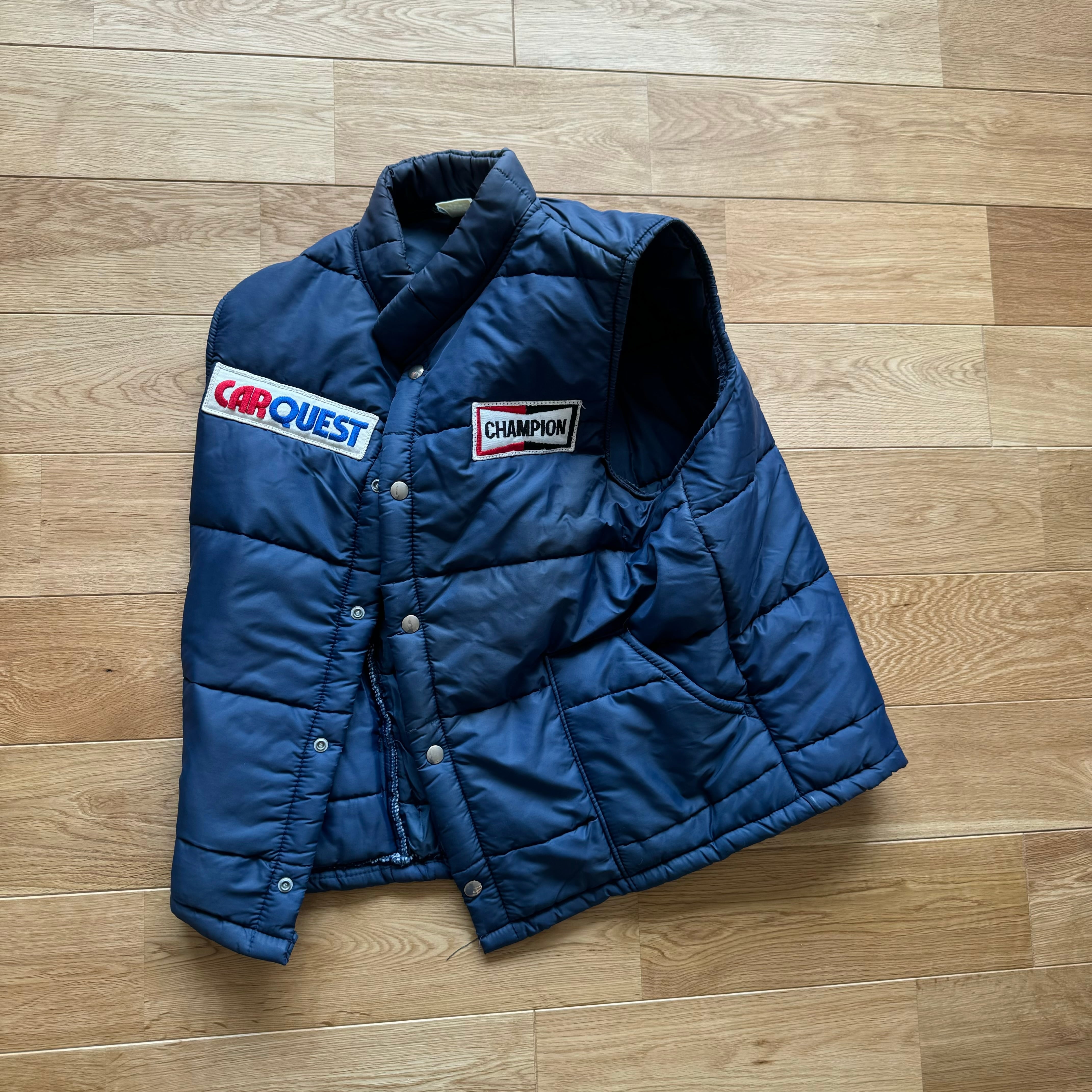 Vintage “Champion Spark Plug x Carquest” Puffer Vest by Cap'N Jac