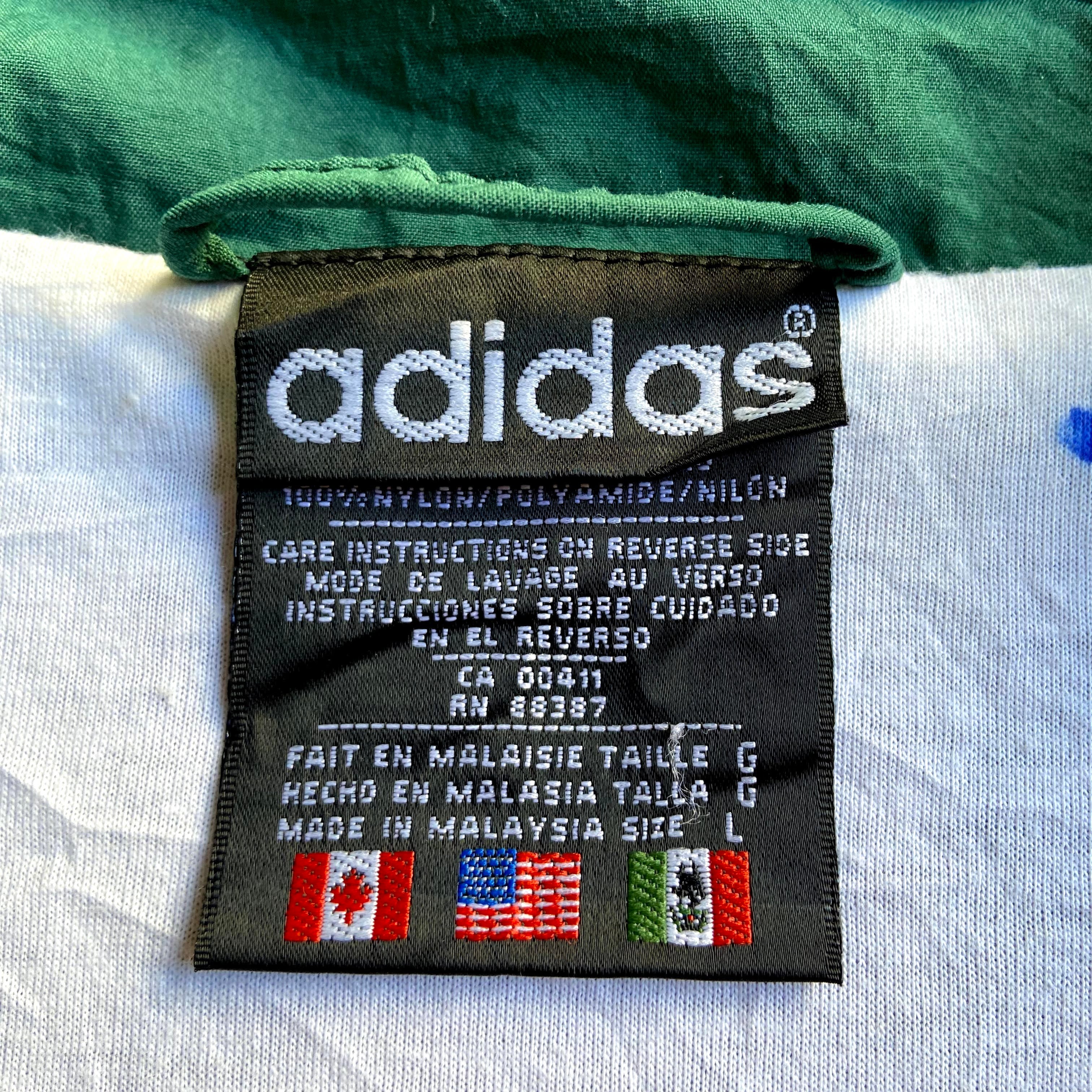 ビンテージ90s白縞×緑黒adidas万国旗タグ ロゴ刺繍ナイロンジャケット