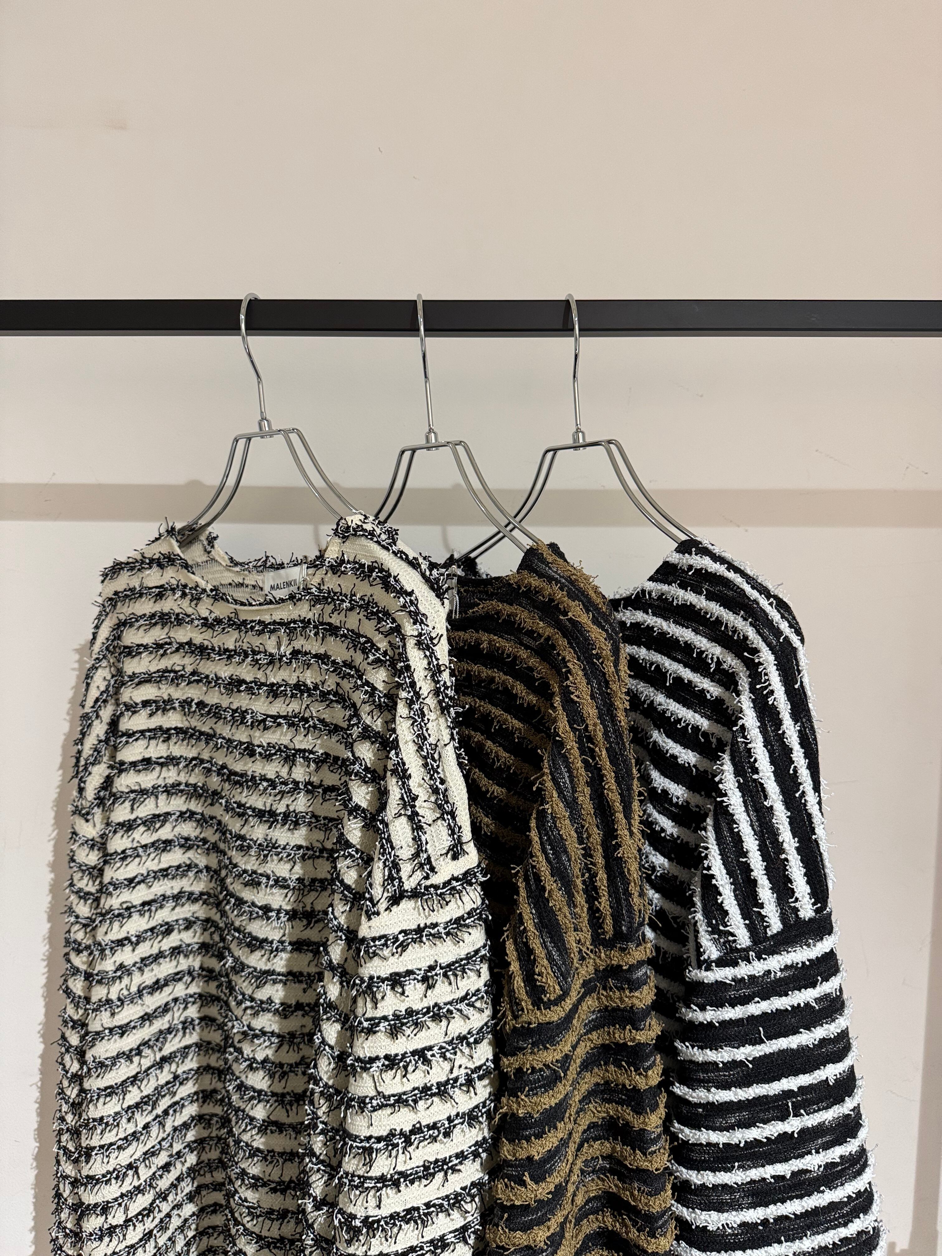 shaggy border knit top