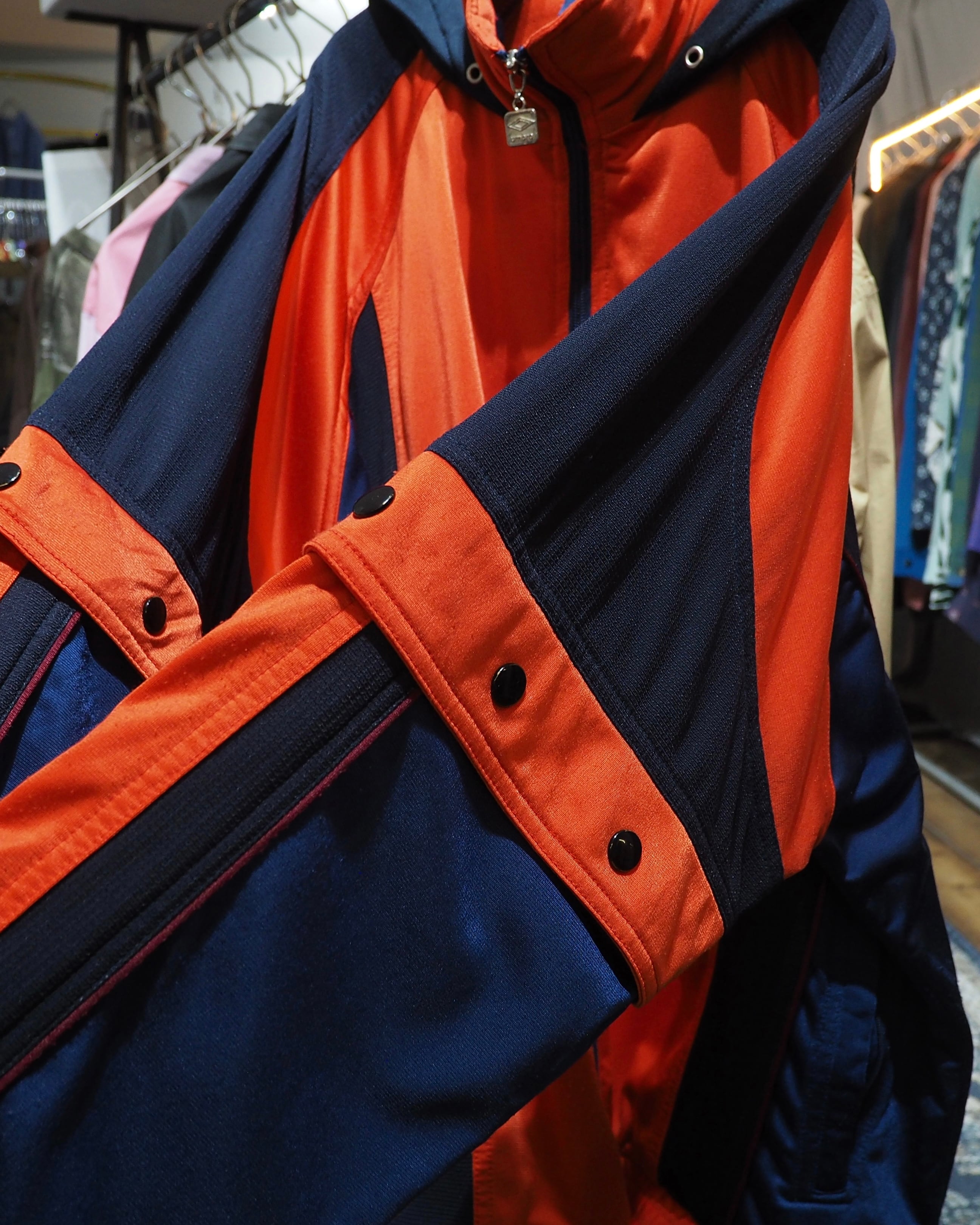 1990s " UMBRO " Vivid Orange × Dark Navy Switching Panel Vintage Loose Track Jacket