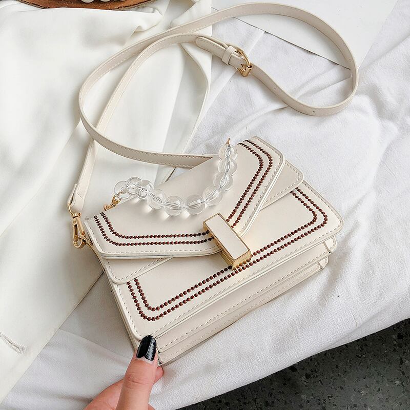 夏の人気の小さなバッグレディースバッグ2020新しいトレンディなファッションハンドキャリーメッセンジャーバッグネット赤真珠ワンショルダー小さな正方形のバッグ Tiancai_Wing_Bag7286409