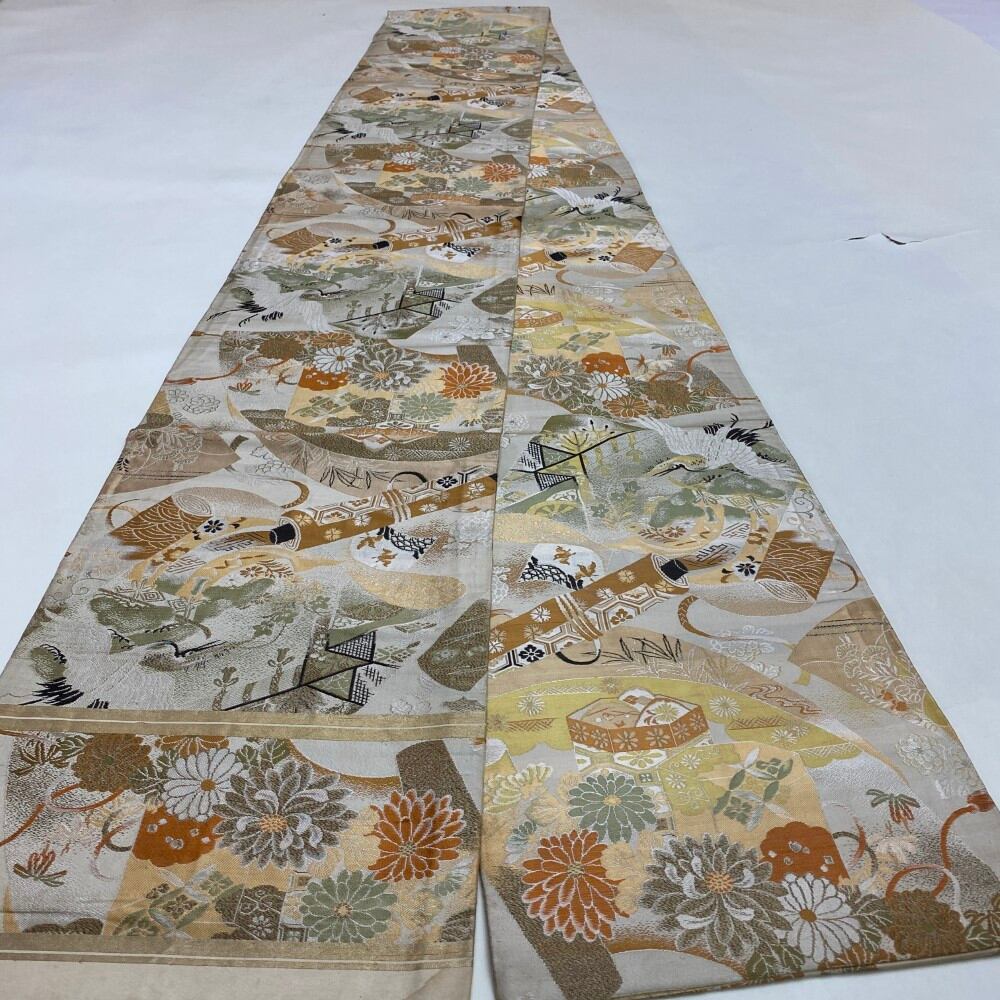 中古 丸帯 正絹 草花 全通柄 ゴールド Dランク 387cm 5679