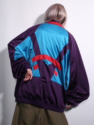 "NIKE" psychedelic color over silhouette track jacket