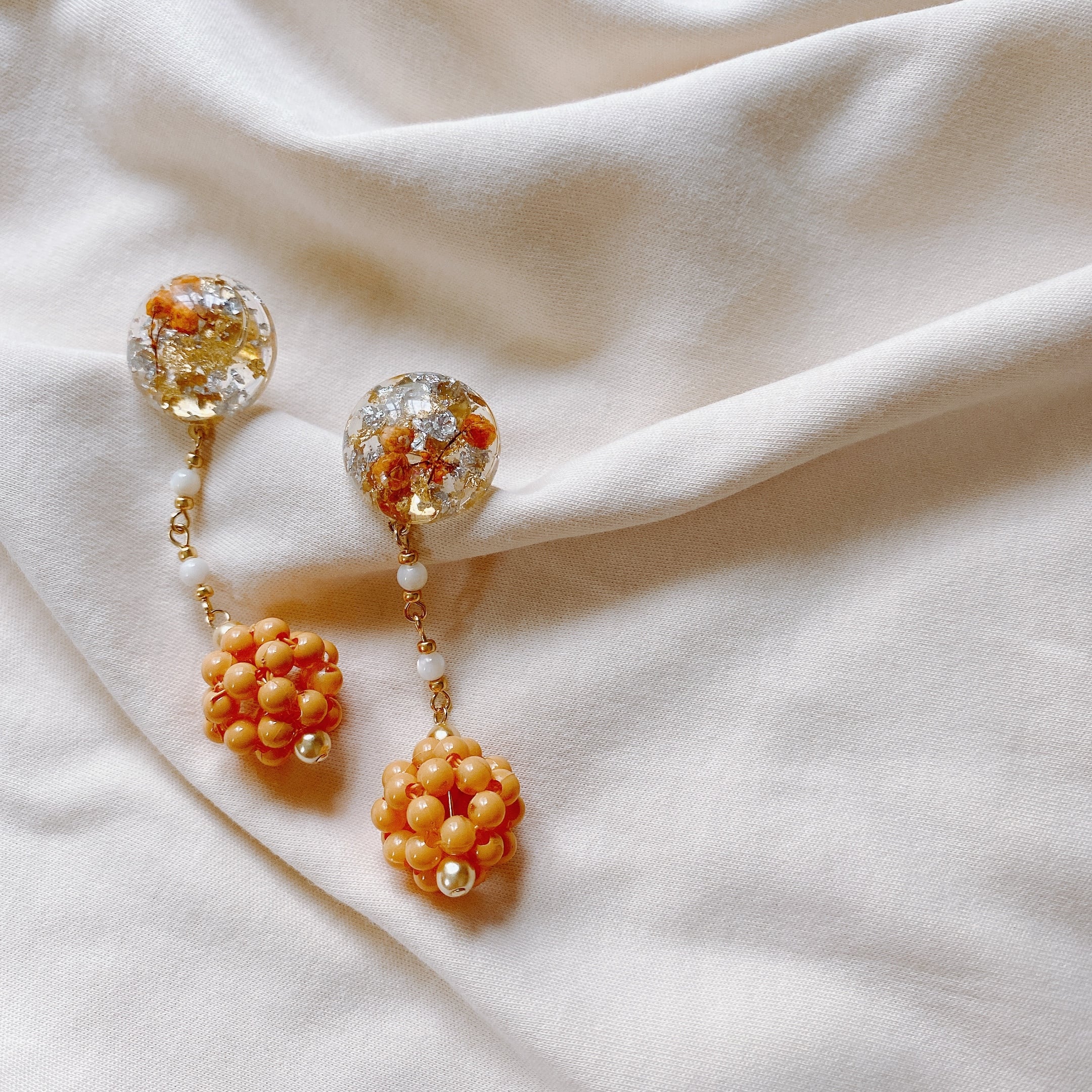 Orange Butsubutsu pierce⭐︎オレンジぶつぶつピアス | Rom.