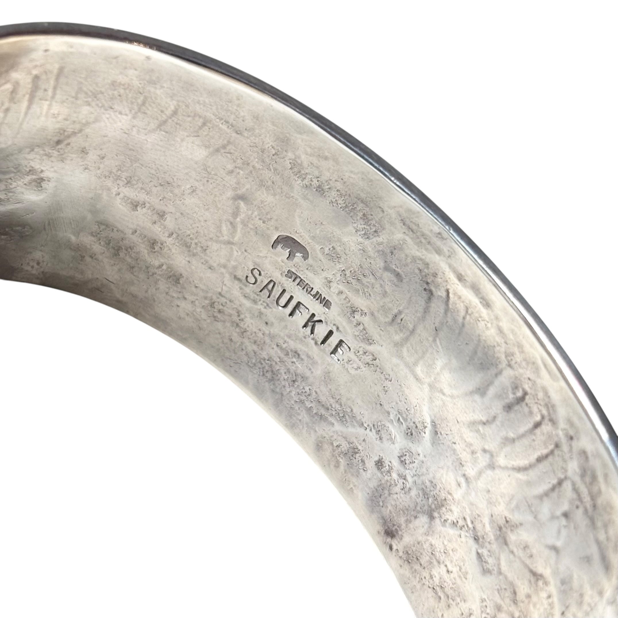 Hopi Lawrence Saufkie silver overlay bangle “walking bear” | NOIR