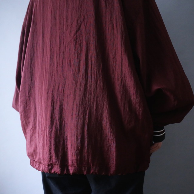 "Champion" one point embroidery design over silhouette nylon pullover