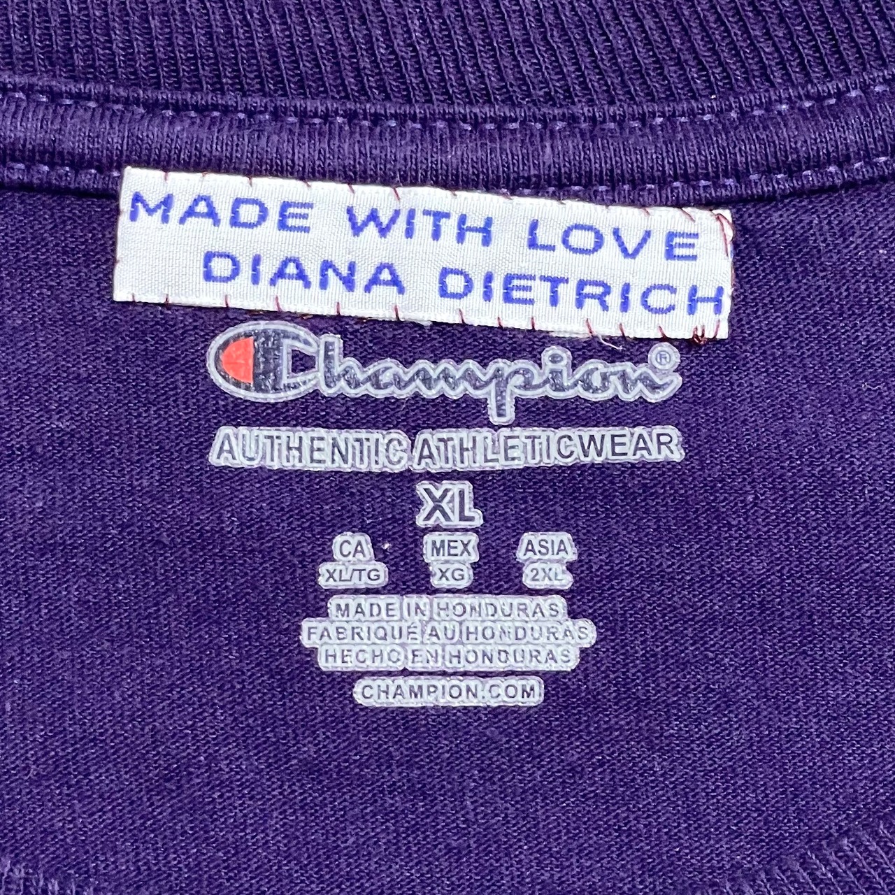 【Champion】カレッジロゴ UMHB メアリー・ハーディン・ベイラー大学 Mary Hardin-Baylor プリント ロンT ロングTシャツ 長袖Tシャツ チャンピオン X-LARGE ビッグサイズ パープル US古着