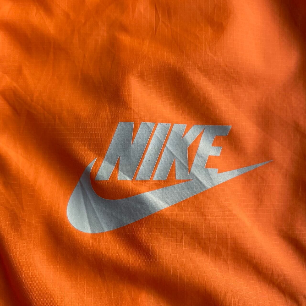 NIKE ナイキ スウォッシュロゴ プリント ウインドブレーカー