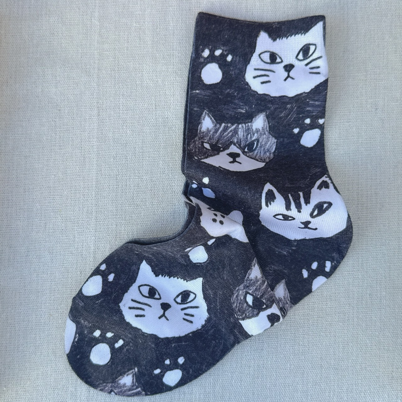 北千住専門お土産屋さん 　猫のお顔総柄靴下