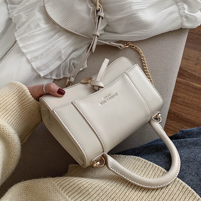 ワイルドファッションアークハーフムーンシェイプスムースフェイスポータブルクロスボディhourglバッグのバッグ女性2020新しい波バージョン Tiancai_Wing_Bag4308258