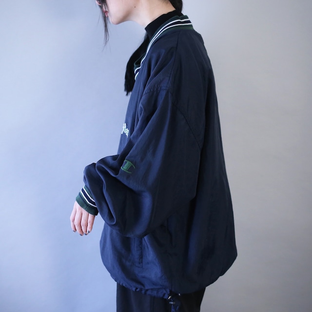 "Champion" front logo design over silhouette nylon pullover