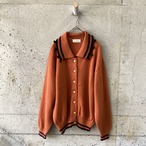 Brown pom-pom knit
