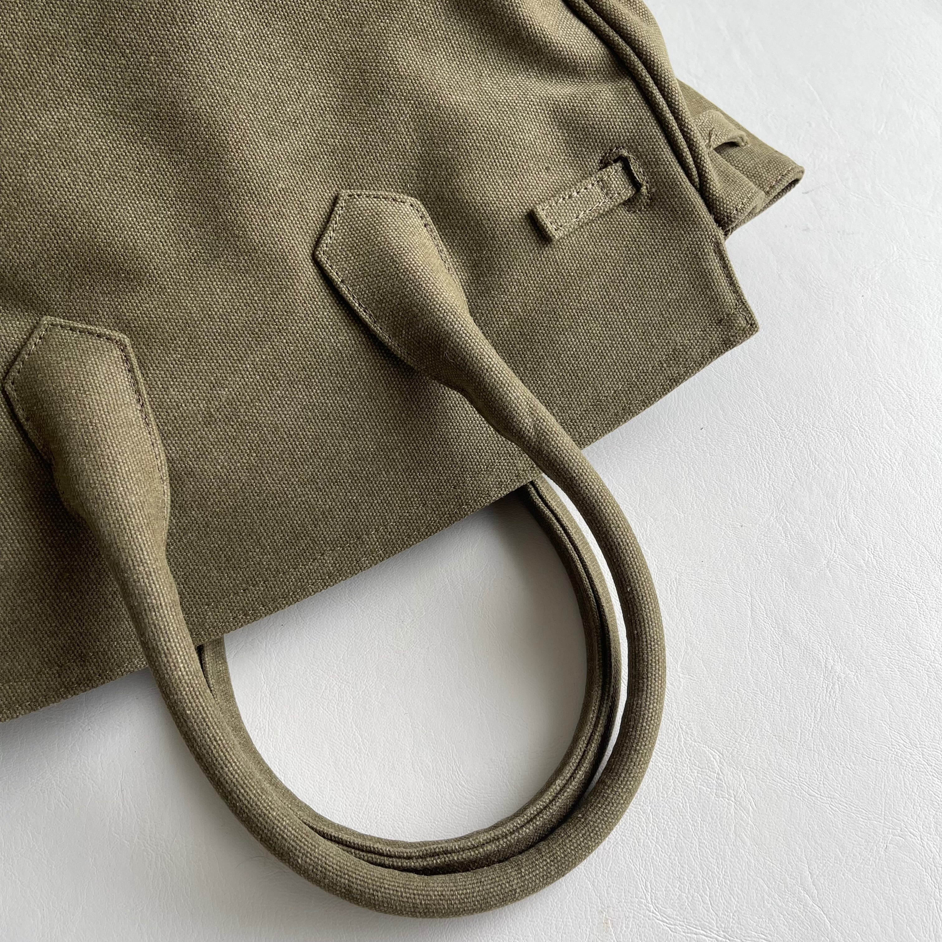 ショルダーバッグ KANAGU MINI BAG wz Smile Plate charm 予約販売】KANAGU Army BAG / mirror smile & mini case charm | meong
