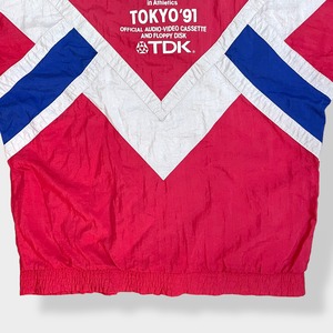 【adidas】80s 世界陸上 1991 東京大会 企業系 企業ロゴ スポンサー TDK ナイロンジャケット ブルゾン プリント 刺繍ロゴ トレフォイル ワンポイント 切替 銀タグ 万国旗タグ コピーライト1988 ヴィンテージ 希少 アディダス us古着