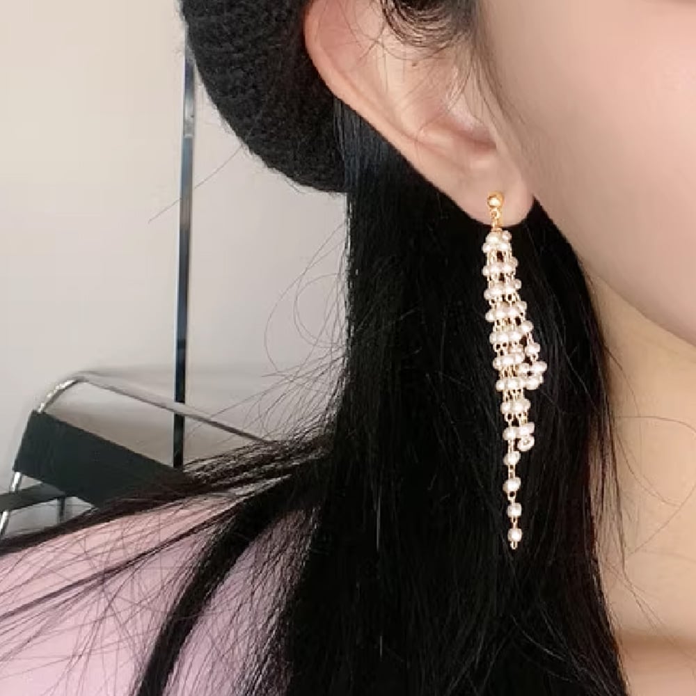 パールレディのタッセルフープの大ぶりピアス - ピアス新しい 