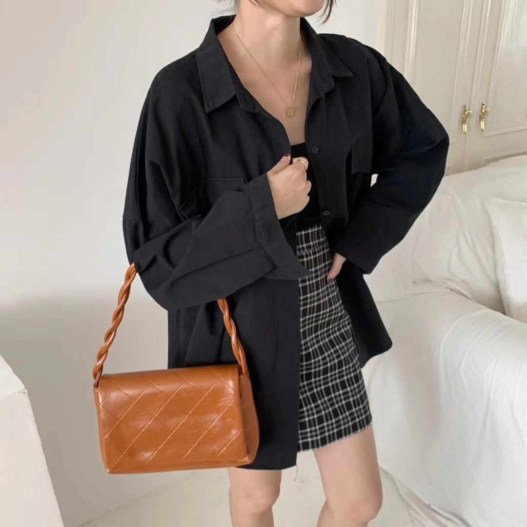 ツイストハンドルフラップバッグ