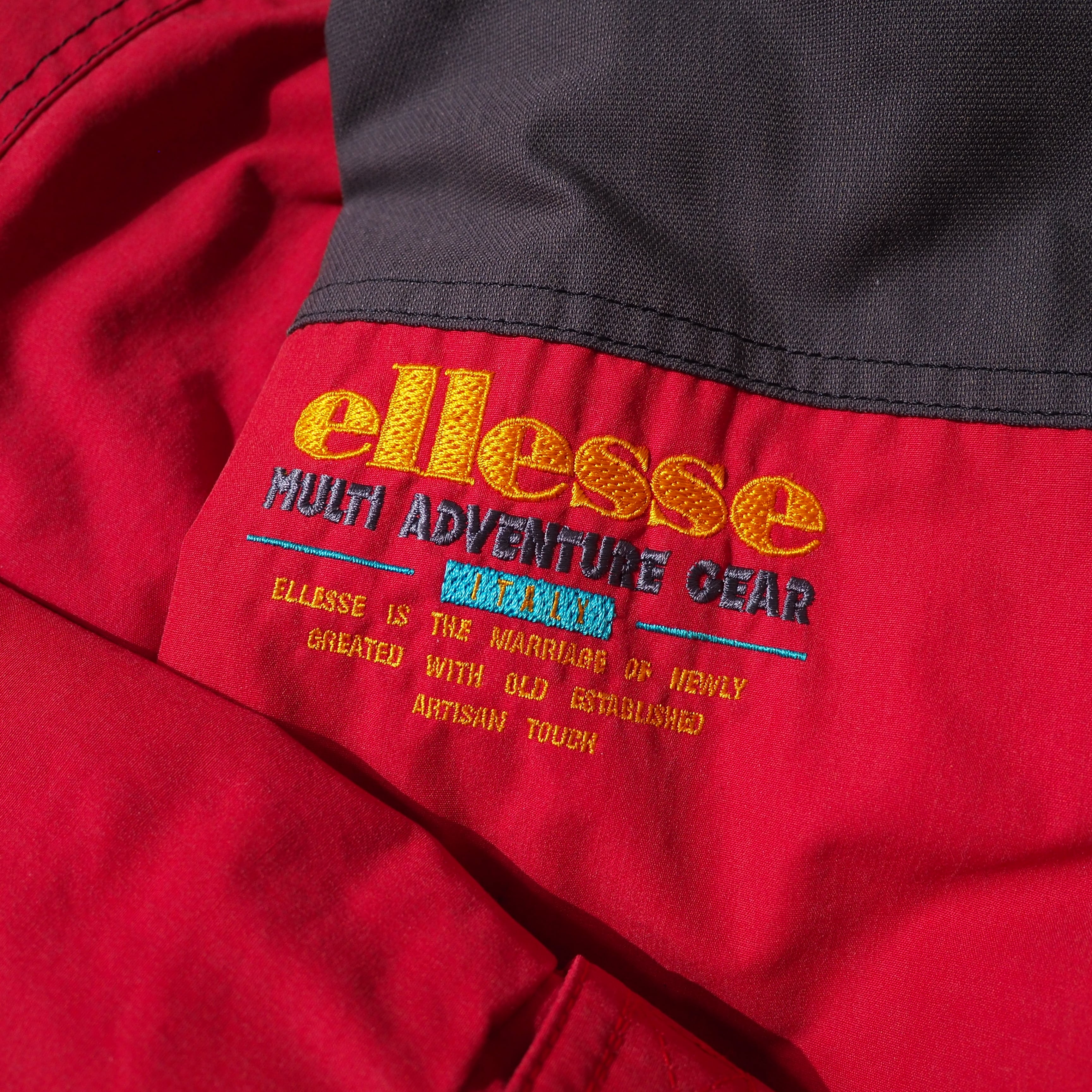 1980 - 90s ” ellesse ” Good multi color full zip vintage nylon jacket Parker